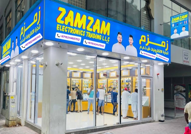 “Shop front view with clean display and products arranged inside, a small retail store.”